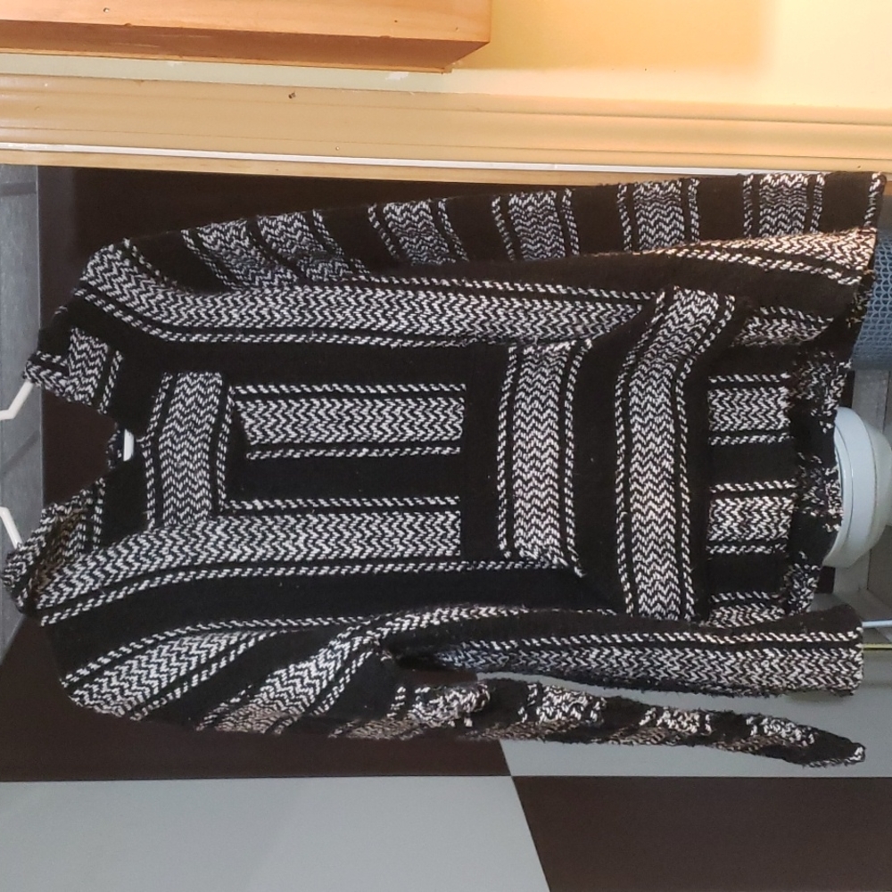 A Journey's Black and White wool sweatshirt or hoodie.